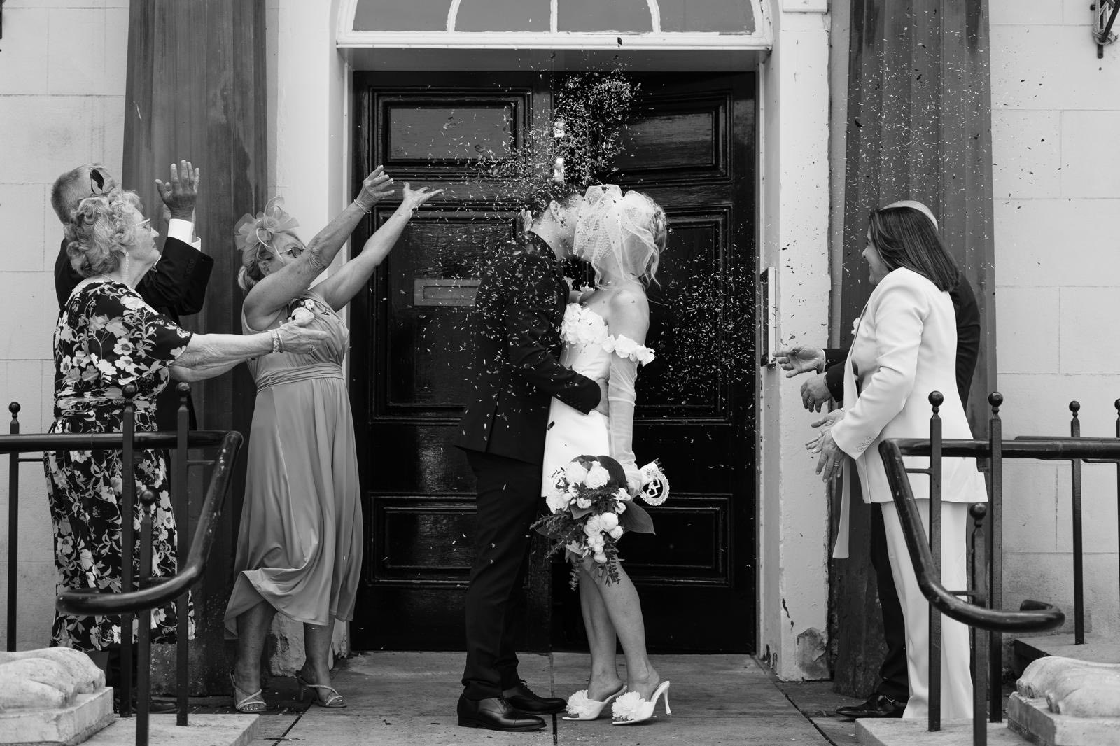 Confetti shower on Bride and Groom